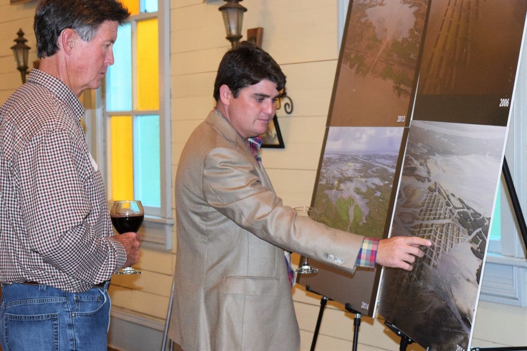 Richie Blink showing new land built by sediment diversions.