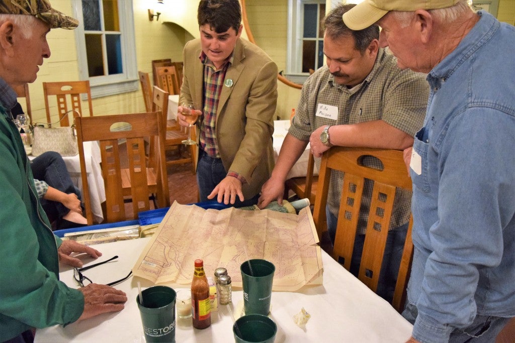 Richie Blink discussing land loss effects on fisheries with local sportsmen.