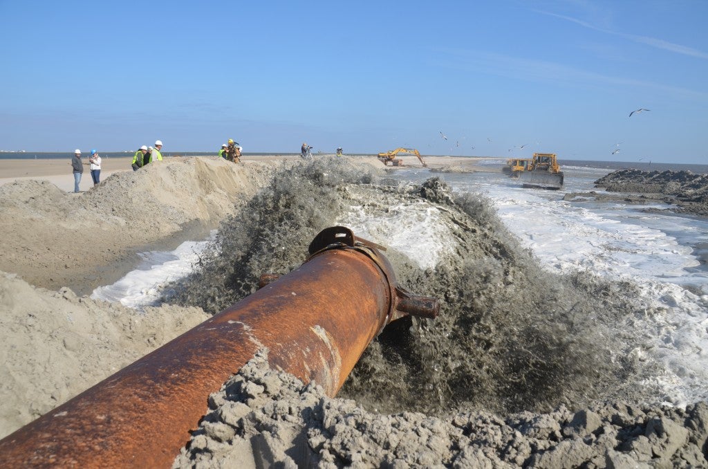 Restoration at work on Caminada Headland.