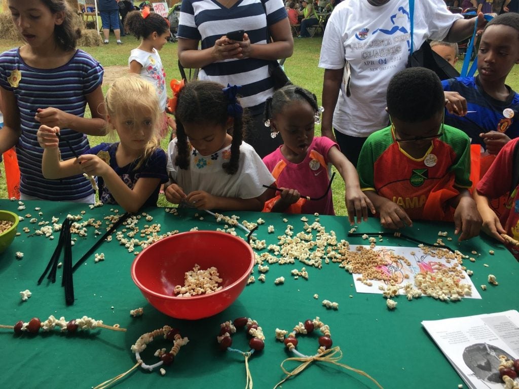 Kids busy stringing bird snacks and making ornaments to decorate their back yard trees. There were many great debates about whether birds or squirrels would feast on their creations.