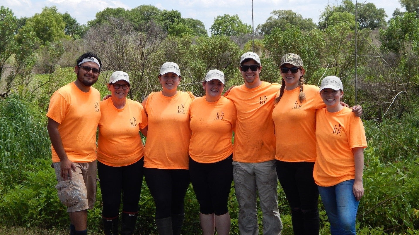 MRD staff members and volunteers planting trees in St. Bernard Parish. Exhausted and dirty, we planted 250 trees!